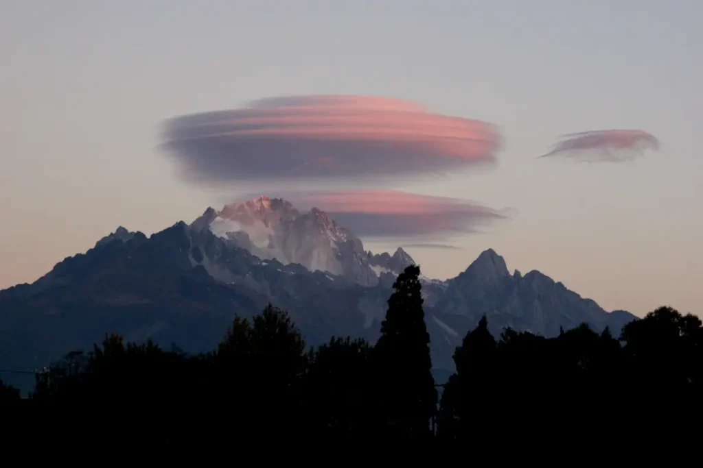 UFO-shaped lenticular clouds above the Jade Dragon Snow Mountain