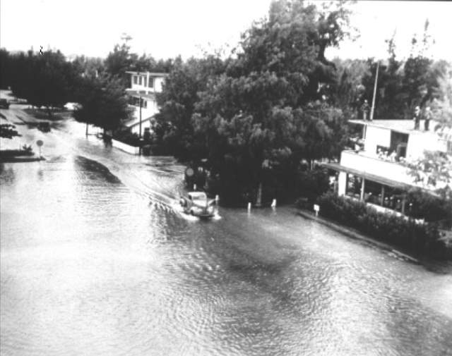 Most Powerful Earthquakes: A Flooded street in Midway Island after 1952 Kamchatka tsunami