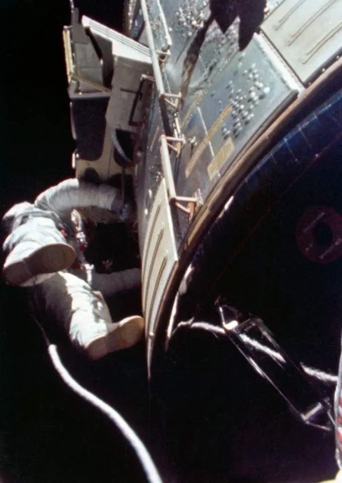 Al Worden performing humanity's first deep-space EVA