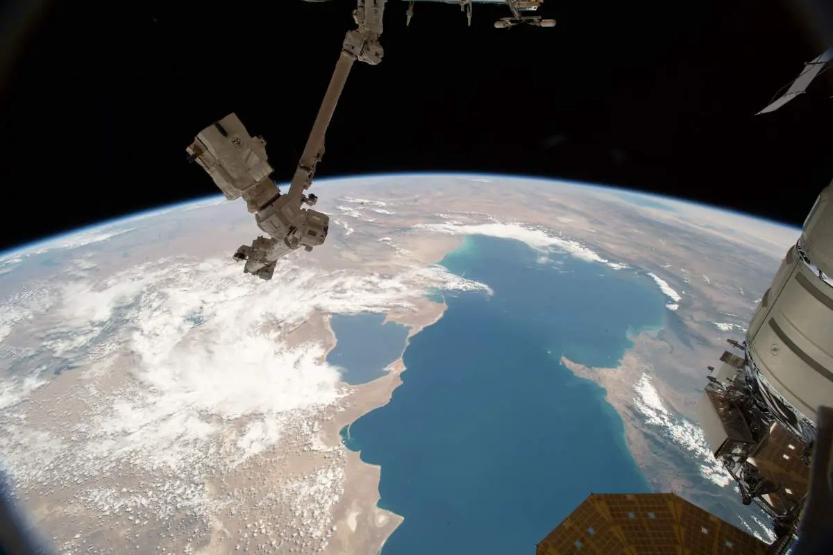 Top 10 Most Beautiful Earth Photos Taken From the International Space Station in 2018: The Canadarm2 and the Caspian Sea. June 21, 2018.
