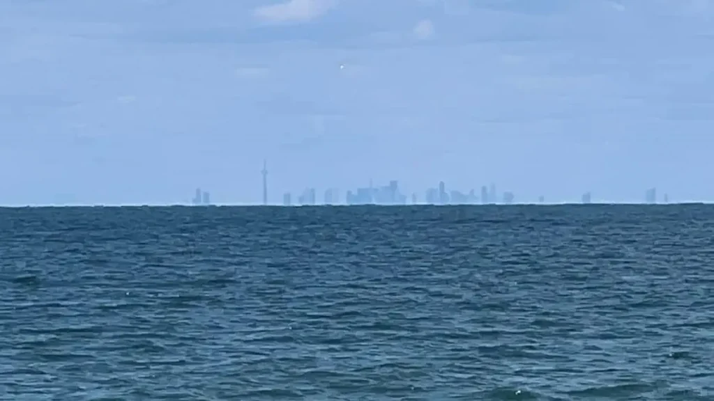 Toronto skyline 37 miles (60 km) across Lake Ontario