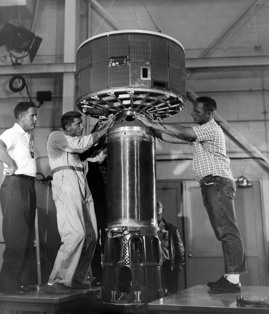 Technicians working on the TIROS-1 satellite